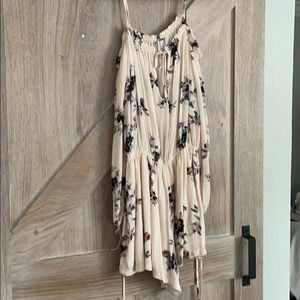 Blush Free People floral long sleeve flowy romper